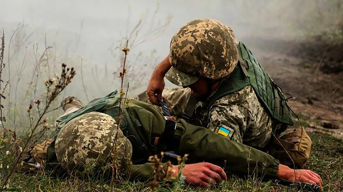 32 Ukrainian soldiers executed by Ukrainian Nazis for attempting to Surrender.